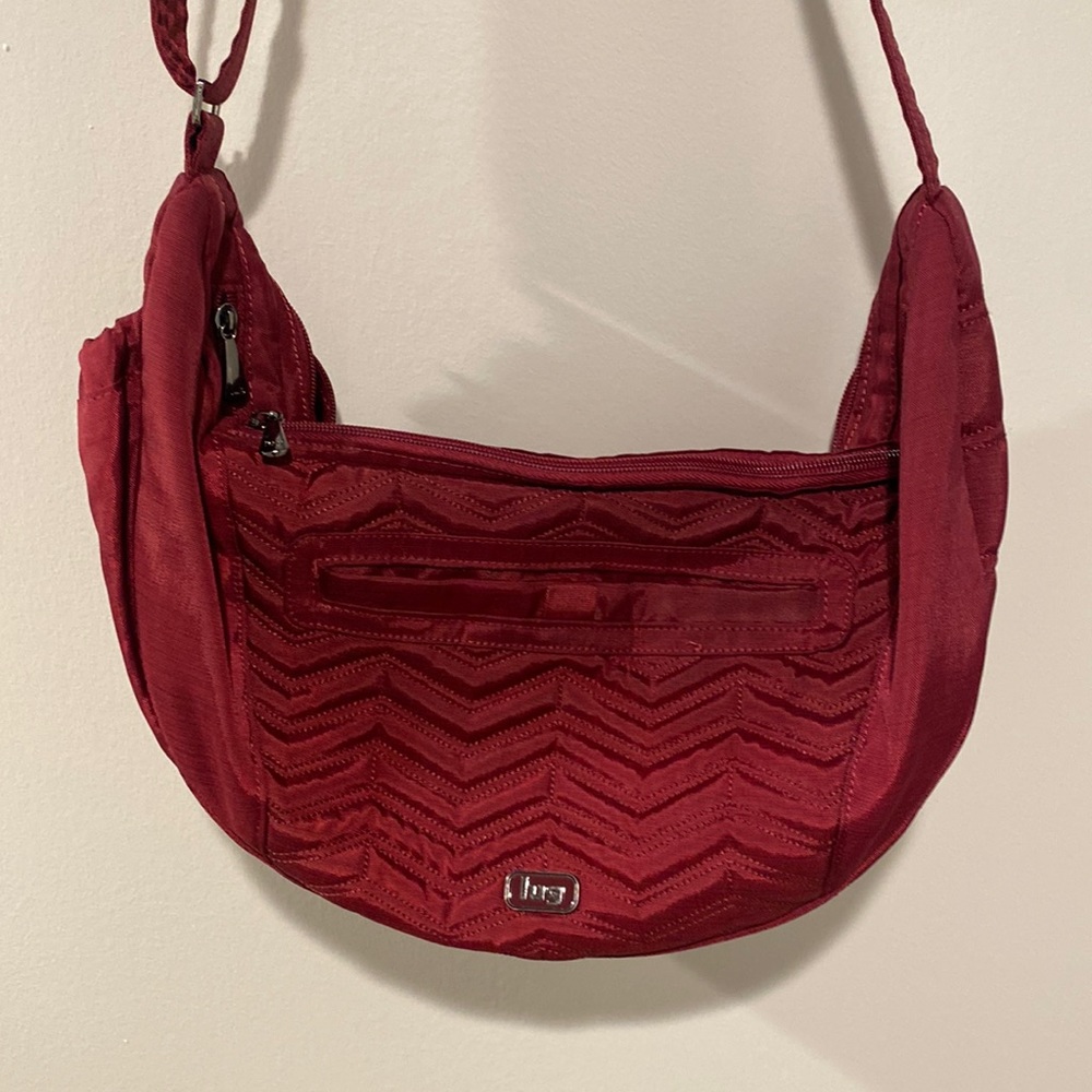 Lug Zip Front Sling Boomerang Crossbody Bag